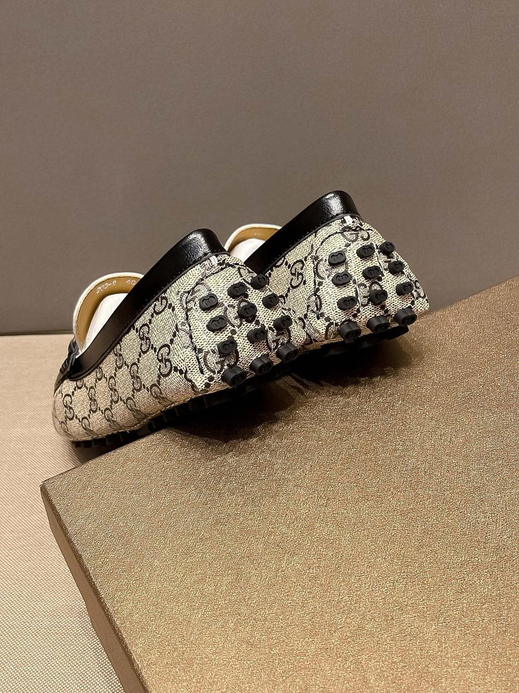Gucci Beige and Black Gold-Hardware Loafers